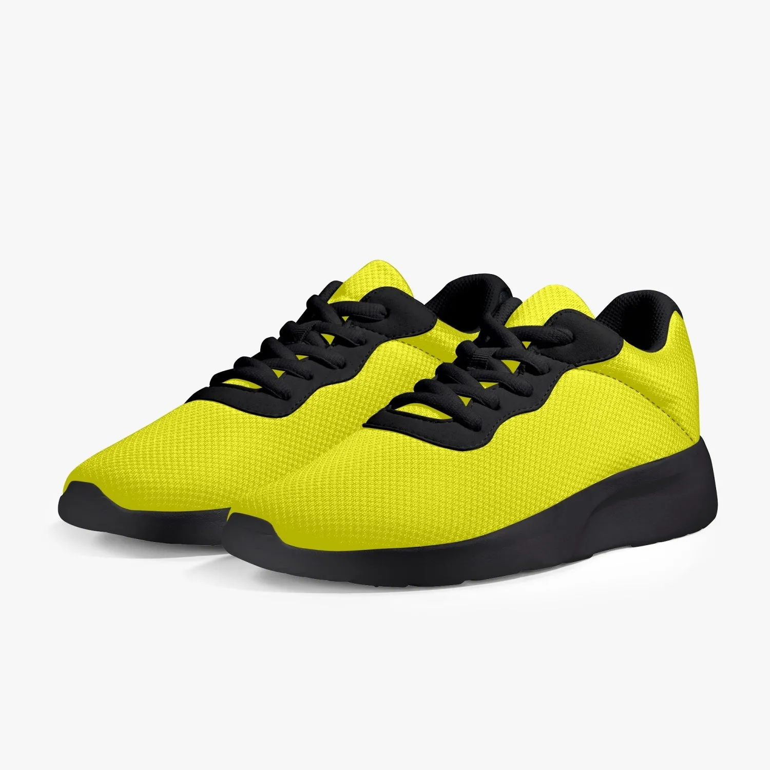 Bright Yellow Color Unisex Sneakers, Soft Solid Yellow Color Best Lifestyle Unisex Casual Designer Mesh Running Shoes With Black Soles