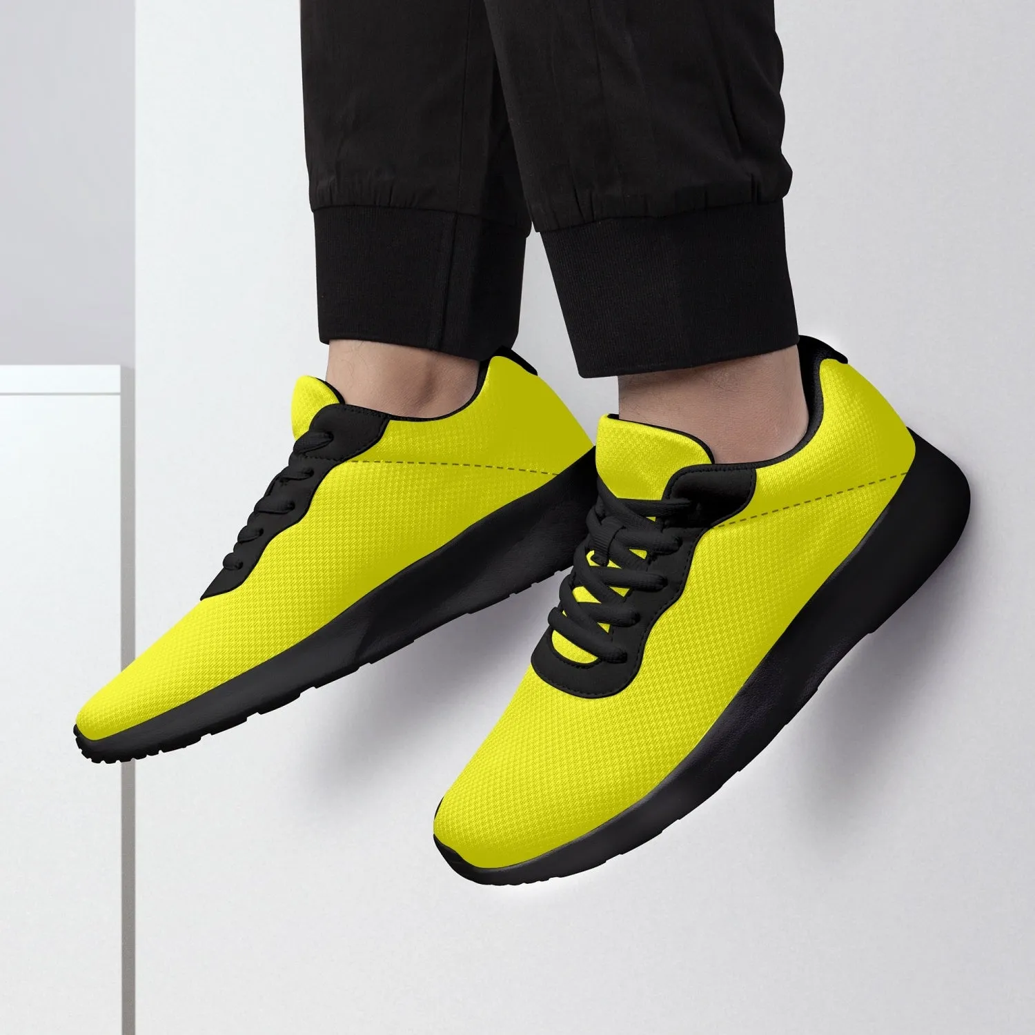 Bright Yellow Color Unisex Sneakers, Soft Solid Yellow Color Best Lifestyle Unisex Casual Designer Mesh Running Shoes With Black Soles